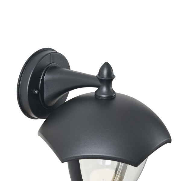 Schwarze Außenwandleuchte aus Metall mit klarem Glasschirm in klassischem Design.