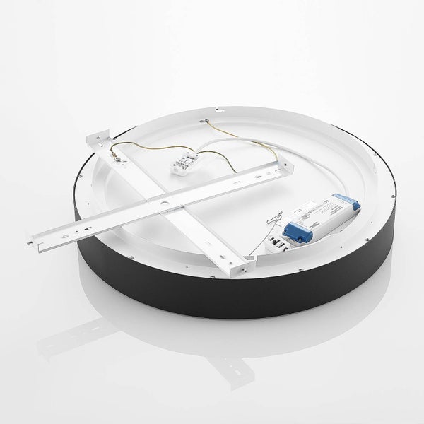 Rückseite einer runden LED Deckenleuchte mit schwarzem Rahmen, Montagehalterung und LED Treiber.