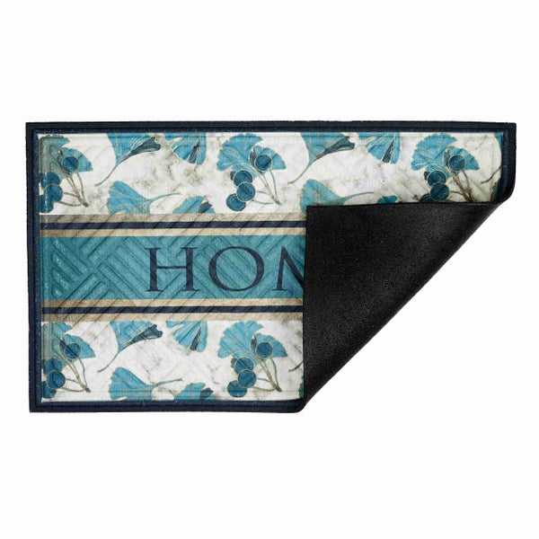 Fußmatte mit Ginkgo-Blättern und dem Schriftzug HOME.