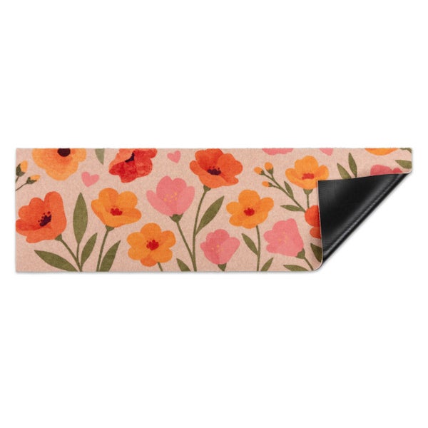 Teppichläufer mit Blumenmuster und rutschfester Rückseite.