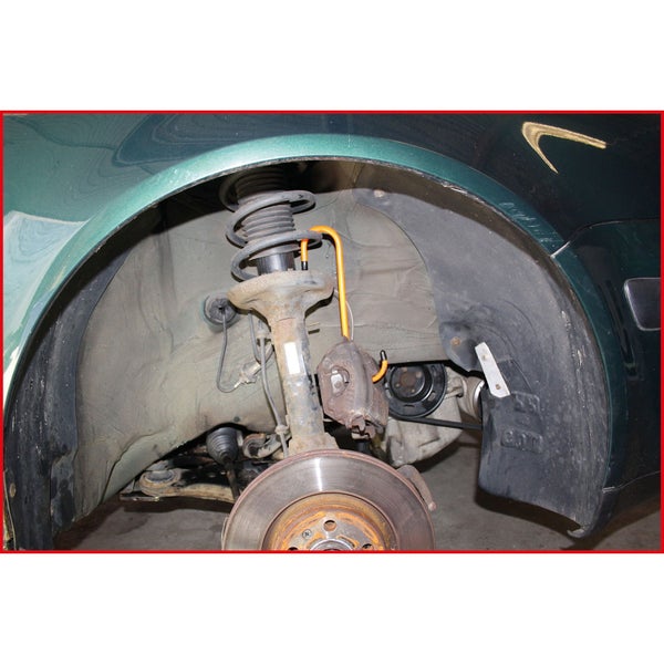 Zwei Federbeinspreizer von KS Tools und die Anwendung am Federbein