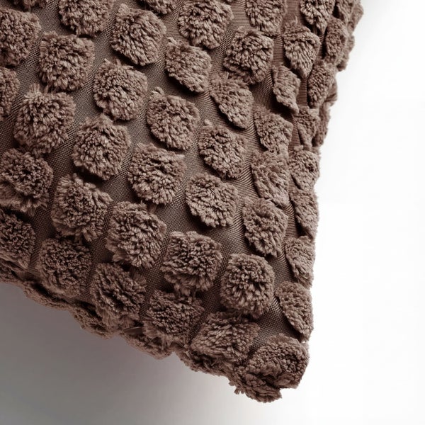 Dekokissen mit Noppenmuster