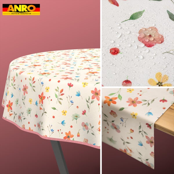 ANRO Logo. Abwaschbare Tischdecke mit Blumenmuster und rosa Paspelband, wasserabweisende Oberfläche.