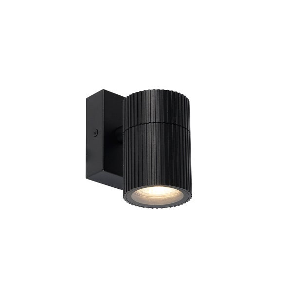 Moderne zylindrische Wandleuchte in Schwarz mit gerippter Oberfläche und Lichtaustritt nach unten.