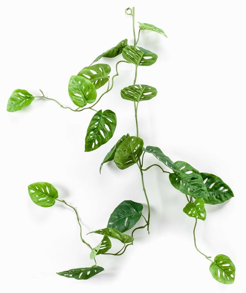 Künstliche Monstera Adansonii Hängeranke mit charakteristisch gelochten grünen Blättern.