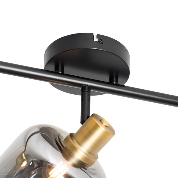 Detailaufnahme einer Deckenleuchte mit Glasschirm