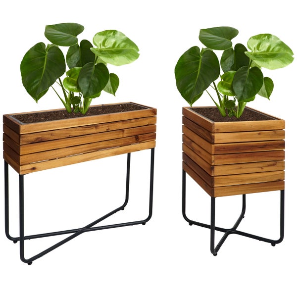 Zwei Hochbeete aus Holzlatten mit schwarzem Metallgestell, bepflanzt mit Monstera-Pflanzen, ein rechteckiges und ein quadratisches Modell.