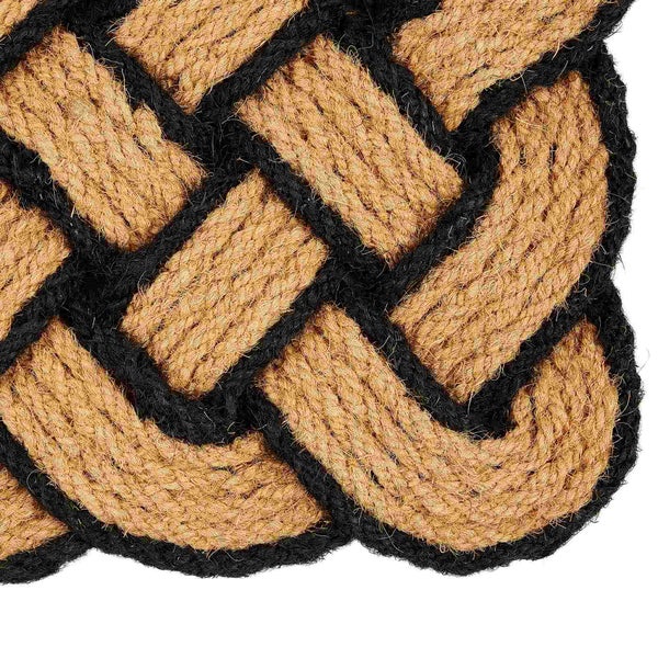 Detailansicht einer Fußmatte aus Kokosfaser mit geflochtenem Muster