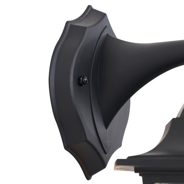 Nahaufnahme einer schwarzen Wandhalterung für eine Leuchte mit dekorativ geschwungenem Rand und Befestigungsschraube.