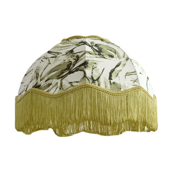 Kuppelförmiger Lampenschirm mit grünem Blattmuster und langen Fransen am unteren Rand.