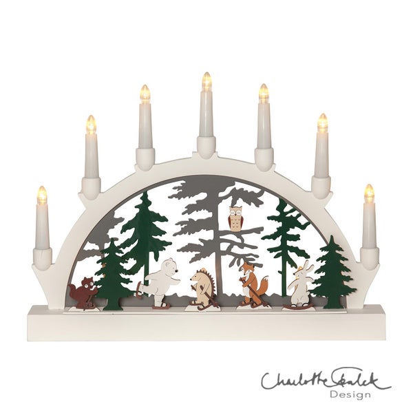 Lichterbogen mit Waldmotiven und Tieren auf Skiern, mit elektrischen Kerzen
