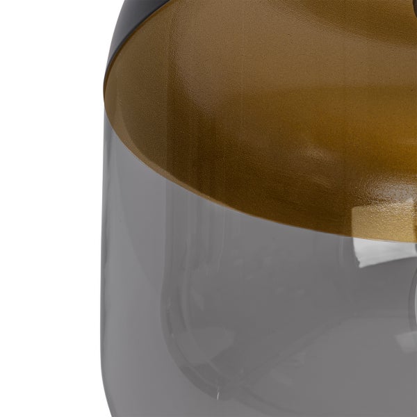 Detailansicht eines Lampenschirms aus Glas in Rauchglas und Gold.