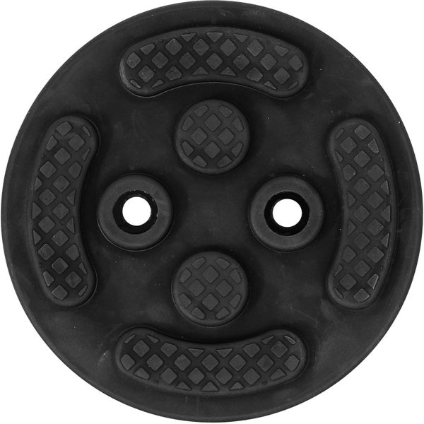 Runde Gummiauflage mit profilierter Oberfläche und zwei Befestigungslöchern.