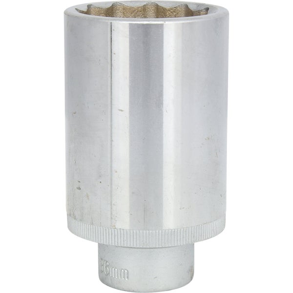 Ein Mann im Bauarbeiteroutfit befestigt mit einem Bolzensetzgerät von Fischer eine Metallschiene am Boden.