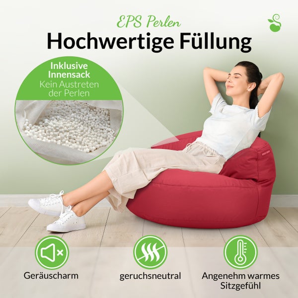 Frau entspannt auf einem roten Sitzsack mit EPS Perlenfüllung und inklusivem Innensack
