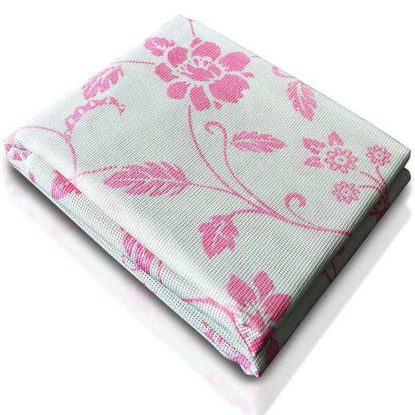 Weichschaummatte mit rosa Blumenmuster.