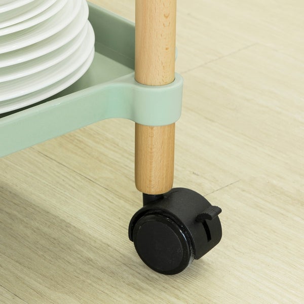 Detailaufnahme eines Servierwagens mit Holzbeinen und Rollen