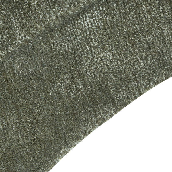 Nahaufnahme eines Teppichbodens aus Textil mit dichter Webstruktur.