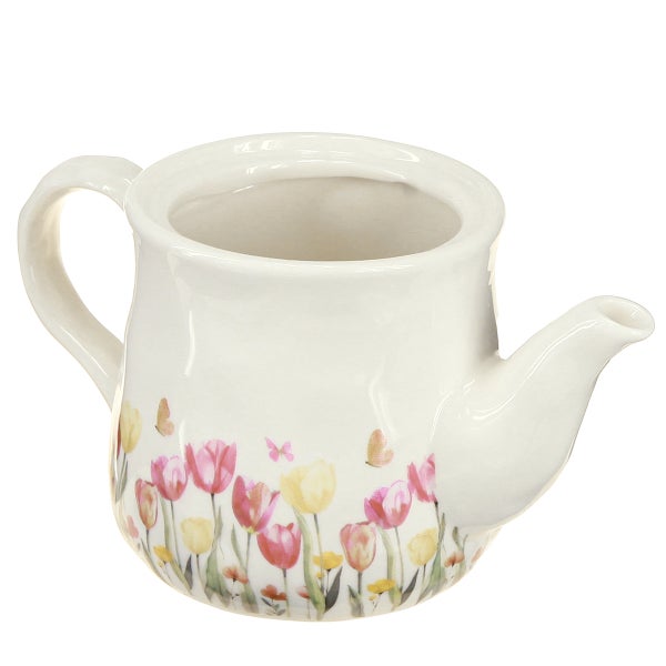 Weißer Keramik-Übertopf in Gießkannenform mit Tulpen-Dekor und Schmetterlingen.