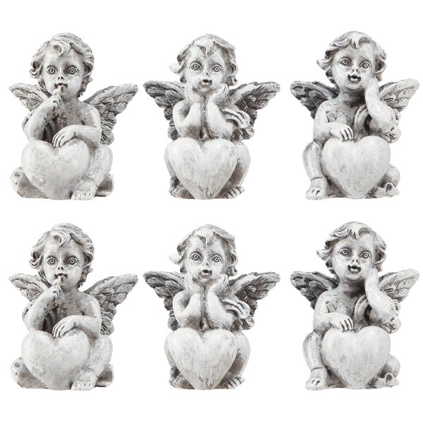 Sechs Engel Figuren mit Herz