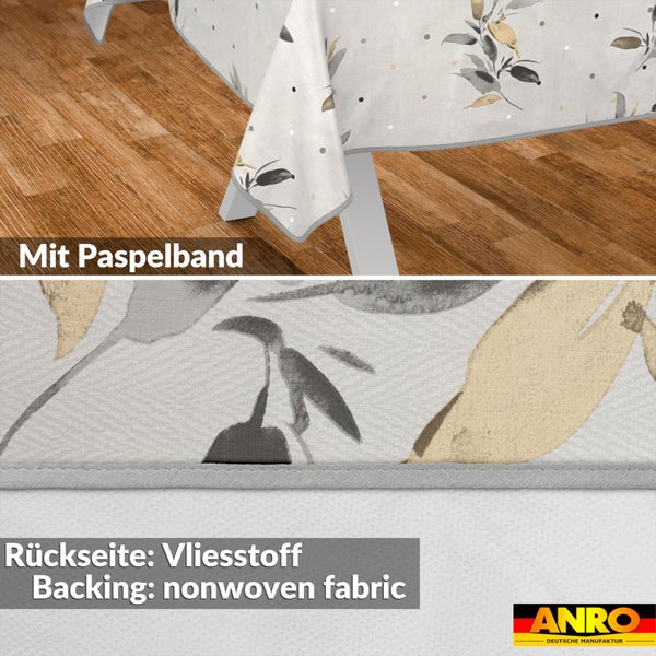 Tischdecke mit Blattmuster und Punkten, Paspelband-Einfassung und Rückseite aus Vliesstoff. ANRO Deutsche Manufaktur Logo.