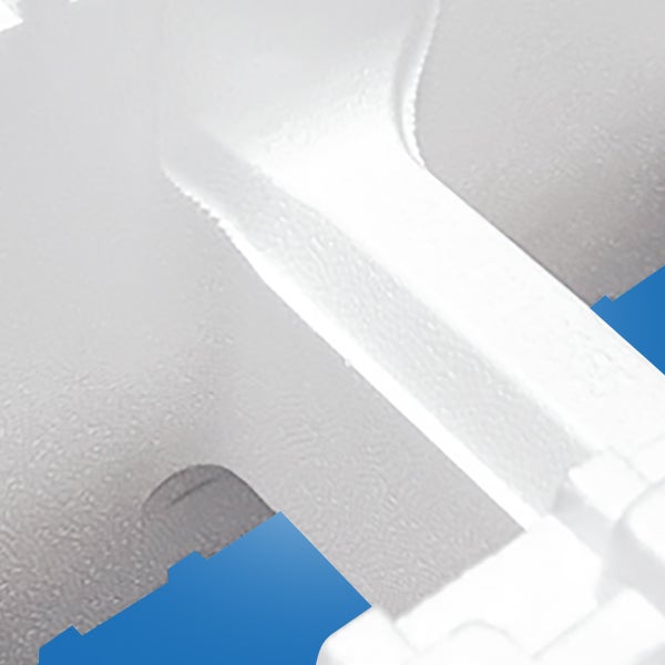 Detailansicht eines weiß strukturierten Schaumstoffmaterials.