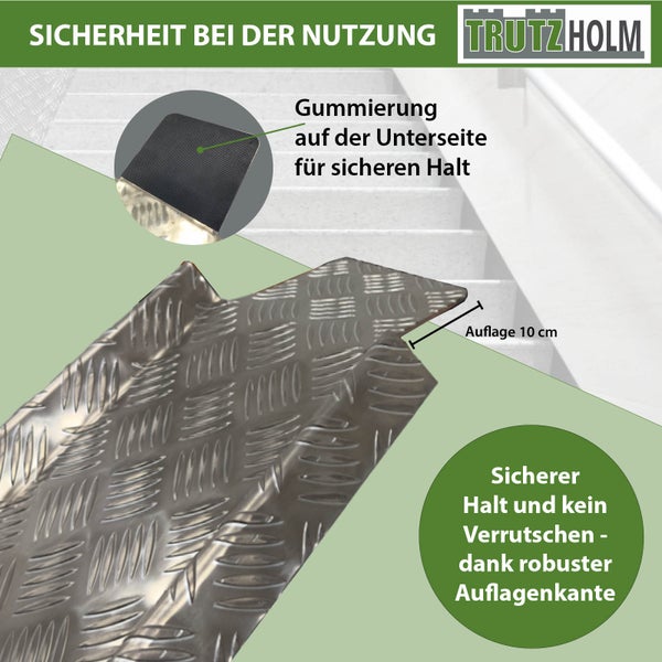 Trutzholm Logo. Detailansicht einer Treppenstufe mit Gummierung und einer Auflage von 10 cm für sicheren Halt.