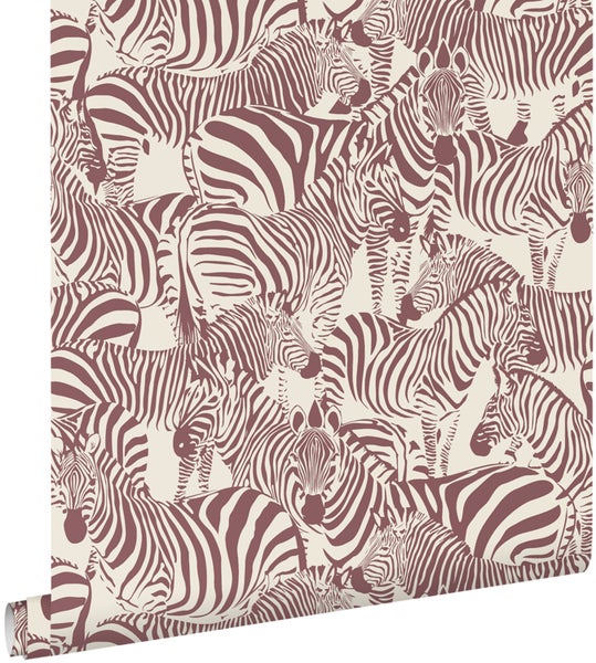 Vliestapete mit einem grafisch illustrierten Muster aus überlappenden Zebras, Tiermotiv für die Wandgestaltung.