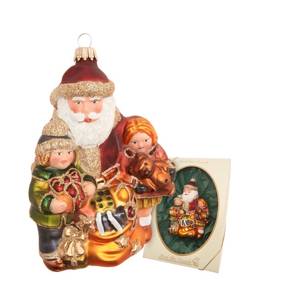 Weihnachtsbaumschmuck aus Glas in Form eines Weihnachtsmanns mit zwei Kindern und Geschenk im Geschenkkarton von Krebs Glas Lauscha.