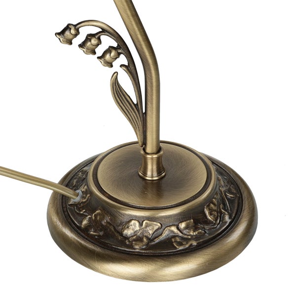 Detailaufnahme einer Tischleuchte mit Blumenmuster und antikem Bronze-Finish