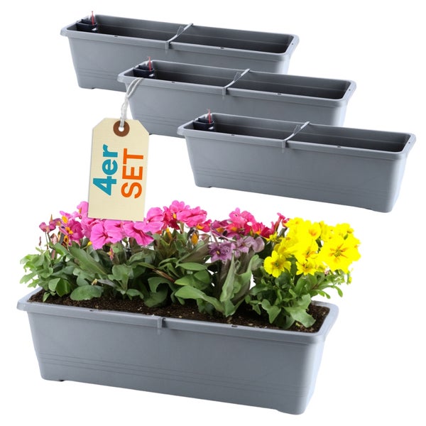 Blumenkasten im Vierer Set mit Bewässerungssystem und bepflanztem Kasten im Vordergrund