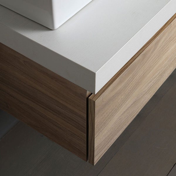 Detailansicht eines Waschtischunterschranks mit Schublade und weißer Waschtischplatte.