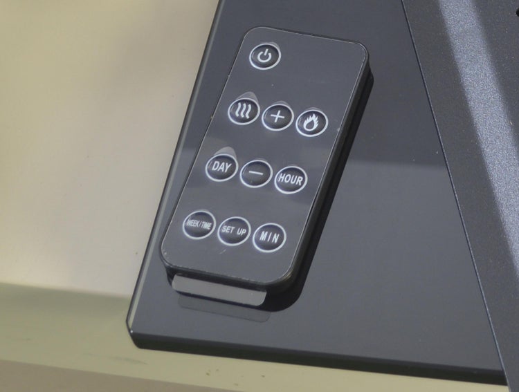 Fernbedienung für Heizgerät mit Tasten zur Steuerung von Temperatur und Zeit