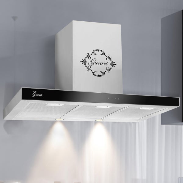 Wandhaube Gurari mit integrierter LED Beleuchtung und Fettfiltern aus Metall zur Montage über dem Kochfeld in einer modernen Küche.