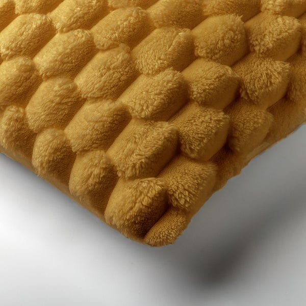 Dekokissen mit Noppenstruktur