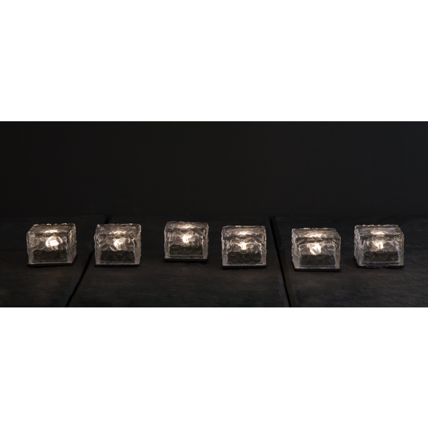 Sechs quadratische Teelichthalter aus Glas