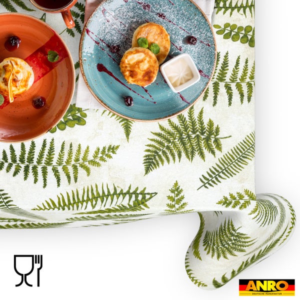 Abwaschbare Tischdecke mit Farn-Motiv, lebensmittelecht. ANRO Deutsche Manufaktur Logo.
