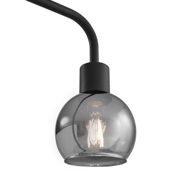Einzelne graue Glaslampe an schwarzer Halterung