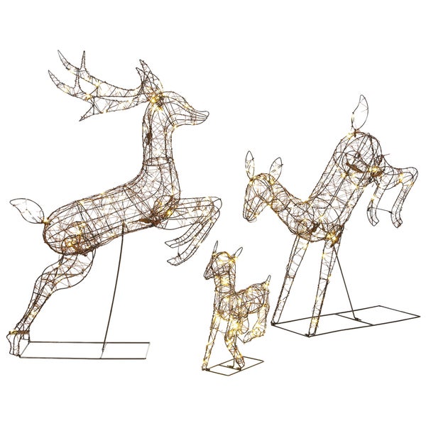 Set aus drei beleuchteten Hirschfiguren aus Drahtgeflecht mit LED Beleuchtung fuer den Innen- und Aussenbereich als Weihnachtsdekoration.