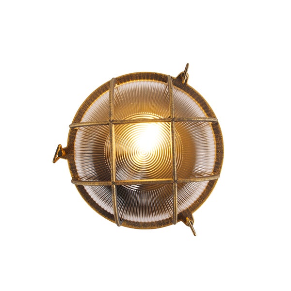 Runde Außenwandleuchte aus Metall in Antik-Optik mit Schutzgitter und geriffeltem Glas, leuchtend.