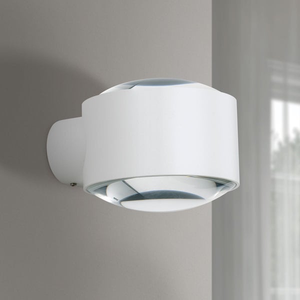 Moderne zylindrische Wandleuchte in Weiß mit Glaslinsen für Up-and-Down-Beleuchtung.