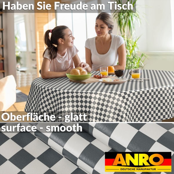 Abwaschbare Tischdecke mit schwarz-weißem Karomuster und glatter Oberfläche in hellem Esszimmer mit einer Familie am Esstisch, ANRO Logo.