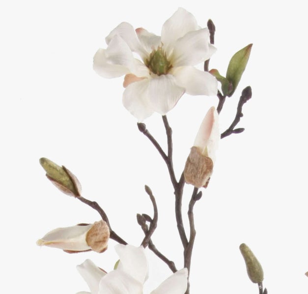 Künstliche goldene Palme mit mehreren Stämmen und gefiederten Wedeln in einem schwarzen Topf.