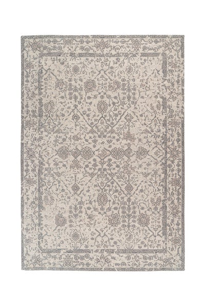 Rechteckiger Teppich mit orientalischem Vintage-Muster, floralen Motiven und einer Bordüre.