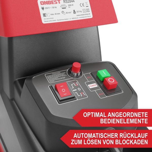 Bedienfeld eines Gartenhäckslers mit Ein- und Ausschalter sowie Drehrichtungsschalter für automatischen Rücklauf.