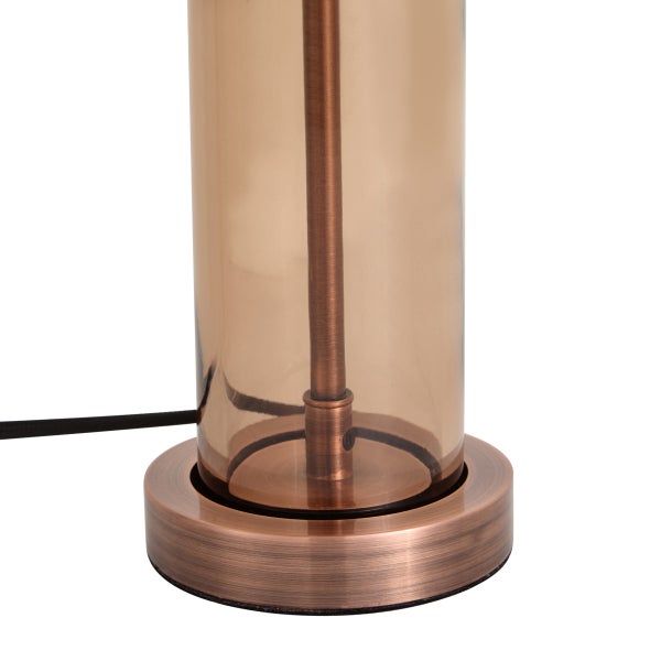 Tischleuchte mit zylindrischem Glas-Lampenschirm und rundem Metallsockel in gebürsteter Optik.