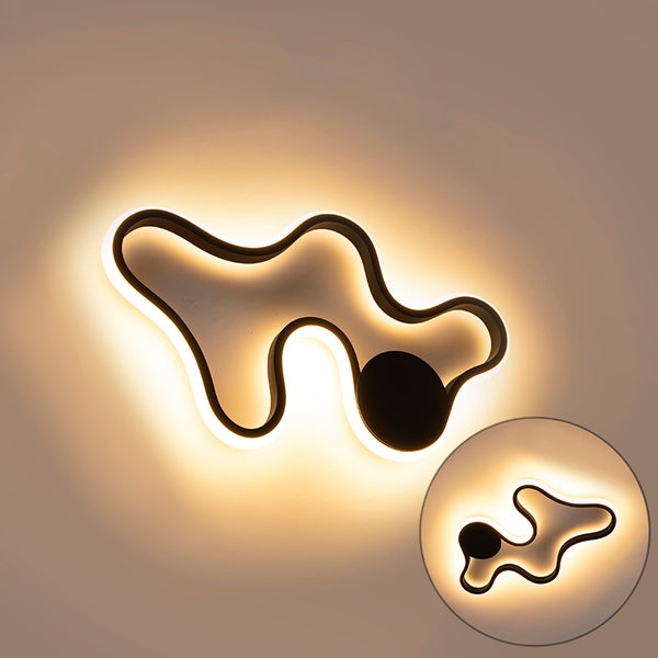 Moderne LED Wandleuchte mit abstraktem Design und schwarzem Akzent