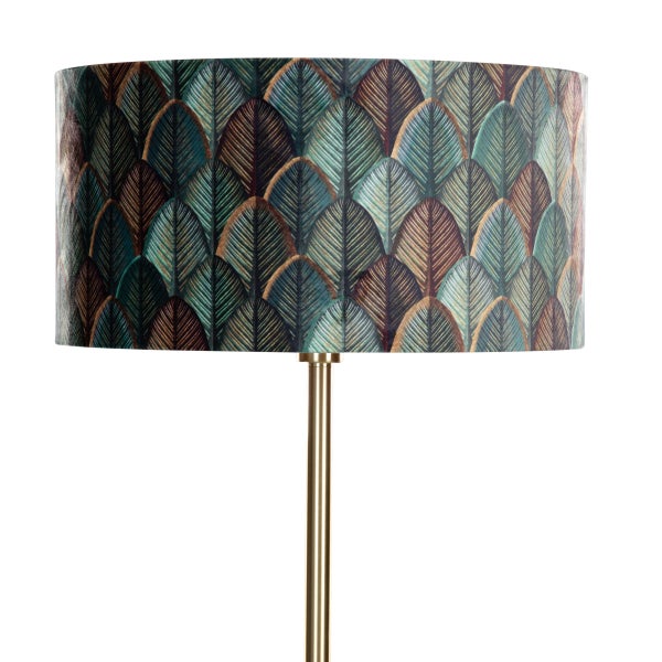 Lampenschirm mit Federdesign auf einem metallenen Leuchtenständer.