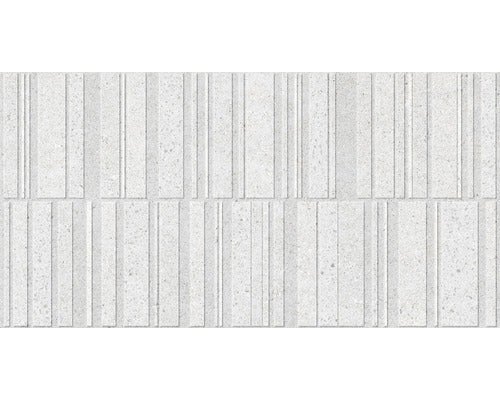 Dekorative Wandfliese mit vertikalem Streifenmuster.