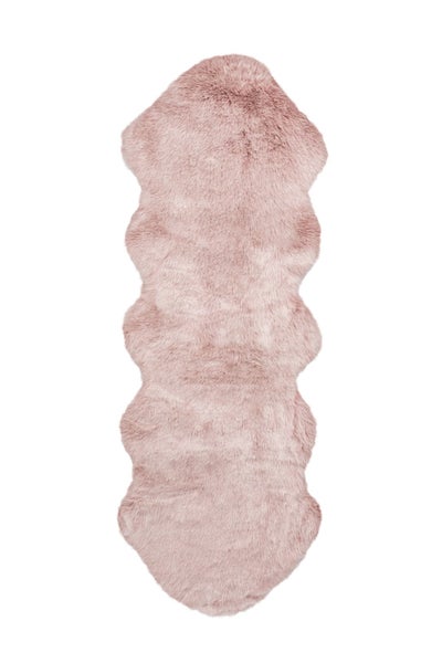 Rosafarbener Kunstfell-Teppich in Wellenform aus Polyester.